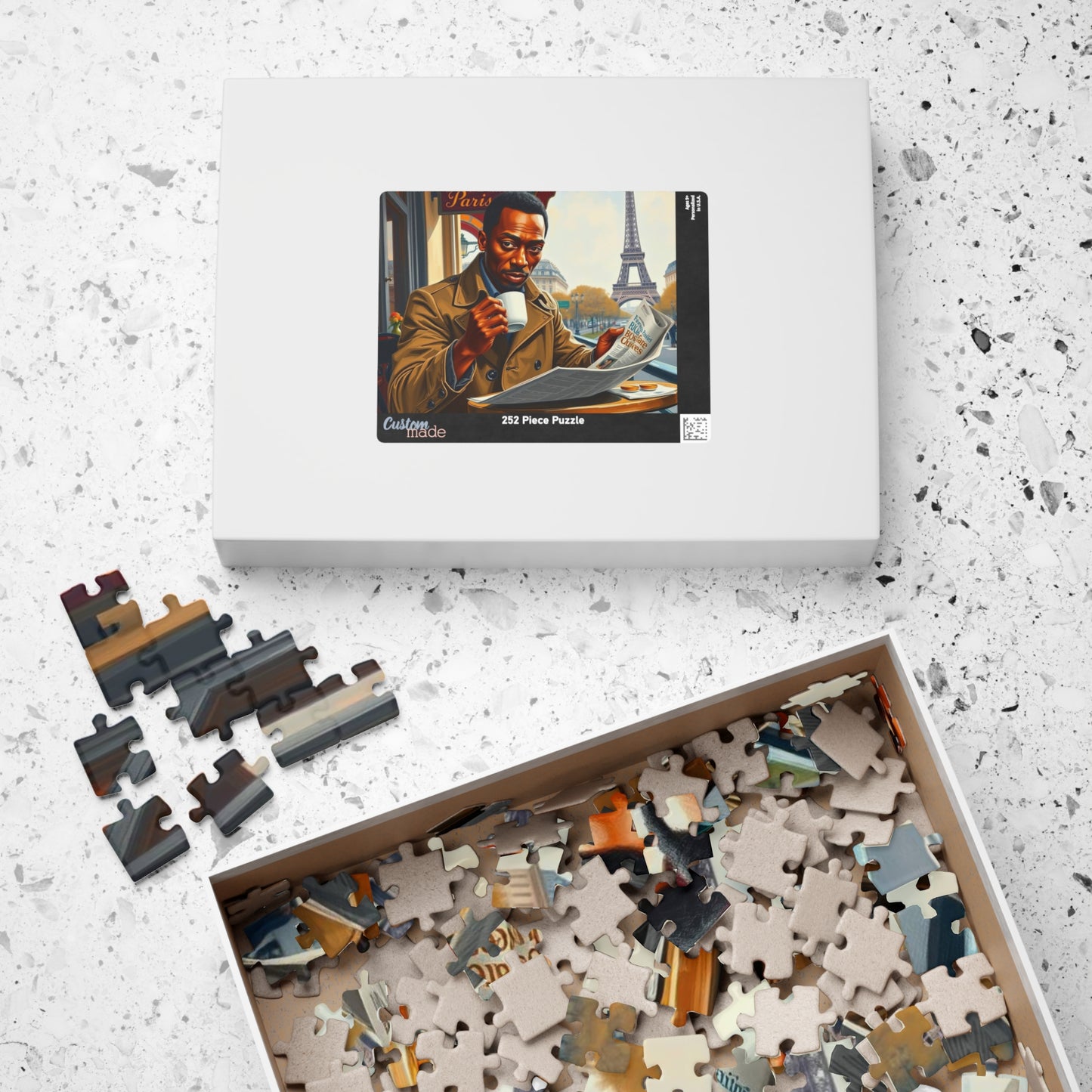 Parisian Café Puzzle - Black Man Reading a Newspaper | Relaxing Jigsaw Game, Puzzle Lover Gift for Friends, Home Entertainment, Family Fun Puzzle The Puzzle Chest