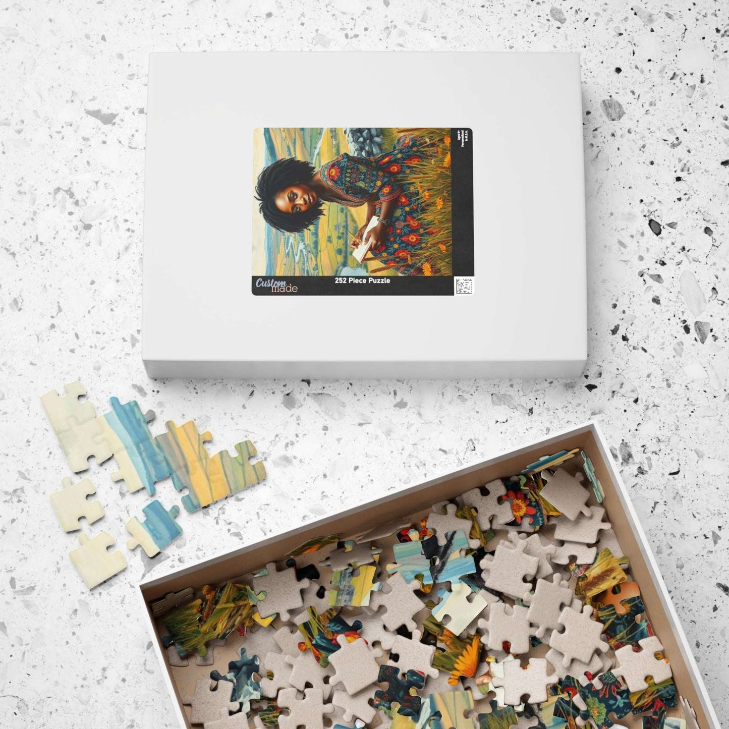 The Sketcher Jigsaw Puzzle - Black Woman Drawing on Hillside, Afrocentric Puzzle Art, African American Artwork Puzzle The Puzzle Chest