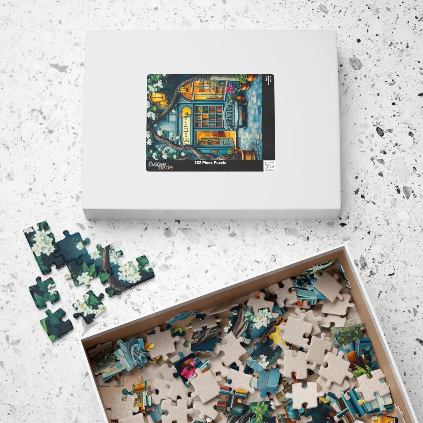 Artistic Bookstore Jigsaw Puzzle – Teal Facade and Garden Bench, Game for Book Lovers Puzzle The Puzzle Chest