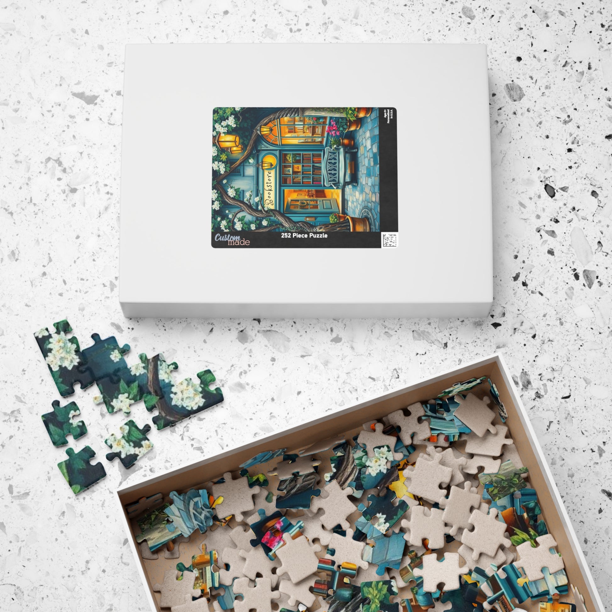 Artistic Bookstore Jigsaw Puzzle – Teal Facade and Garden Bench, Game for Book Lovers Puzzle The Puzzle Chest