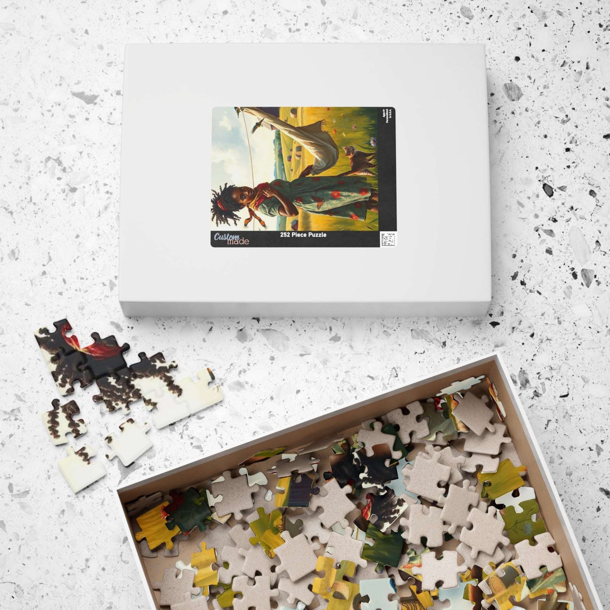 The Laundress Jigsaw Puzzle – Black Woman Hanging Laundry with Cat, Afrocentric Art, African American Artwork Puzzle The Puzzle Chest