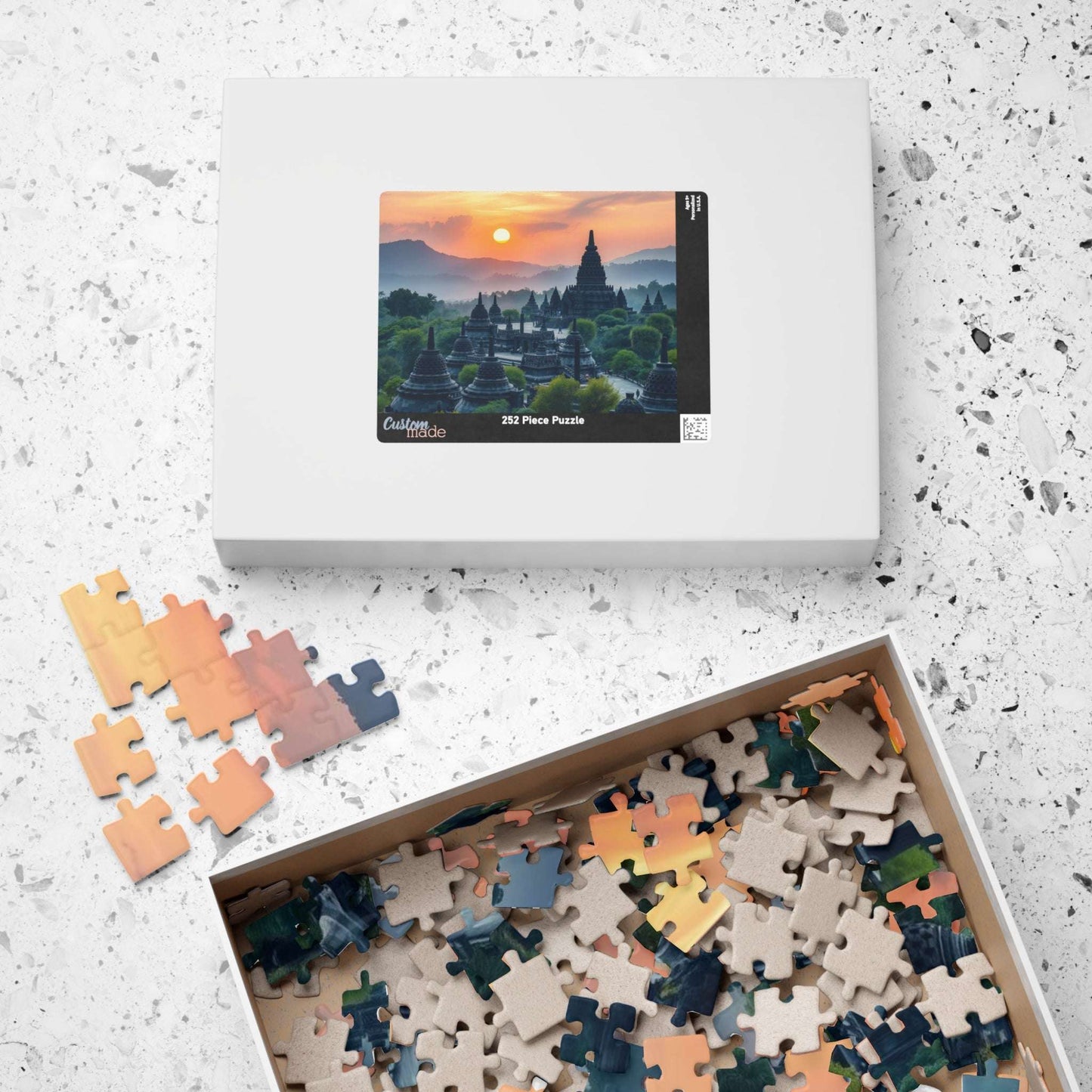 Borobudur Temple Jigsaw Puzzle – Ancient Buddhist Monument in Lush Jungle, Sacred Landmark of Indonesia Puzzle The Puzzle Chest
